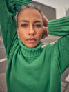 green knitted cotton rollneck with deep ribbed hem, cuffs and neck model shot