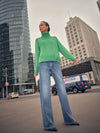 green knitted cotton rollneck with deep ribbed hem, cuffs and neck model shot
