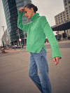  green knitted cotton rollneck with deep ribbed hem, cuffs and neck model shot