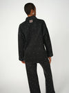 black denim shirt with studs all over model shot rear