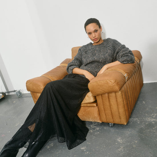 round neck wool patterned sequin black jumper with long sleeves and crew neck  model shot from Mos mosh