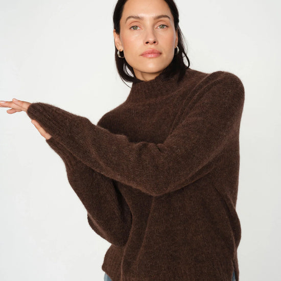 Brown turtle neck knit from Mos Mosh on a model worn with jeans