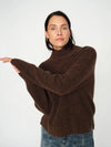 Brown turtle neck knit from Mos Mosh on a model worn with jeans