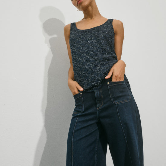 wide leg jeans with front pocket, centre front seam model shot