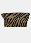 zebra fold over bag with gold emblum and rivet strap rear view