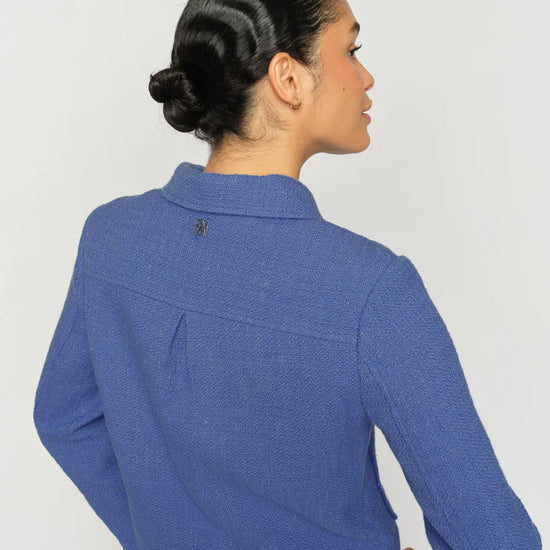 blue jacket with gold buttons and 2 pockets  rear