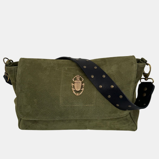 green nubuck leather fold over bag with gold scarab detail and rivet strap