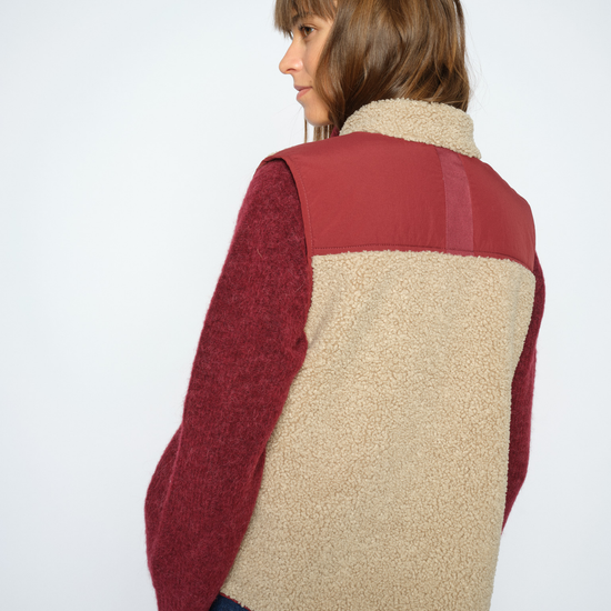 model rear shot of wearing vest