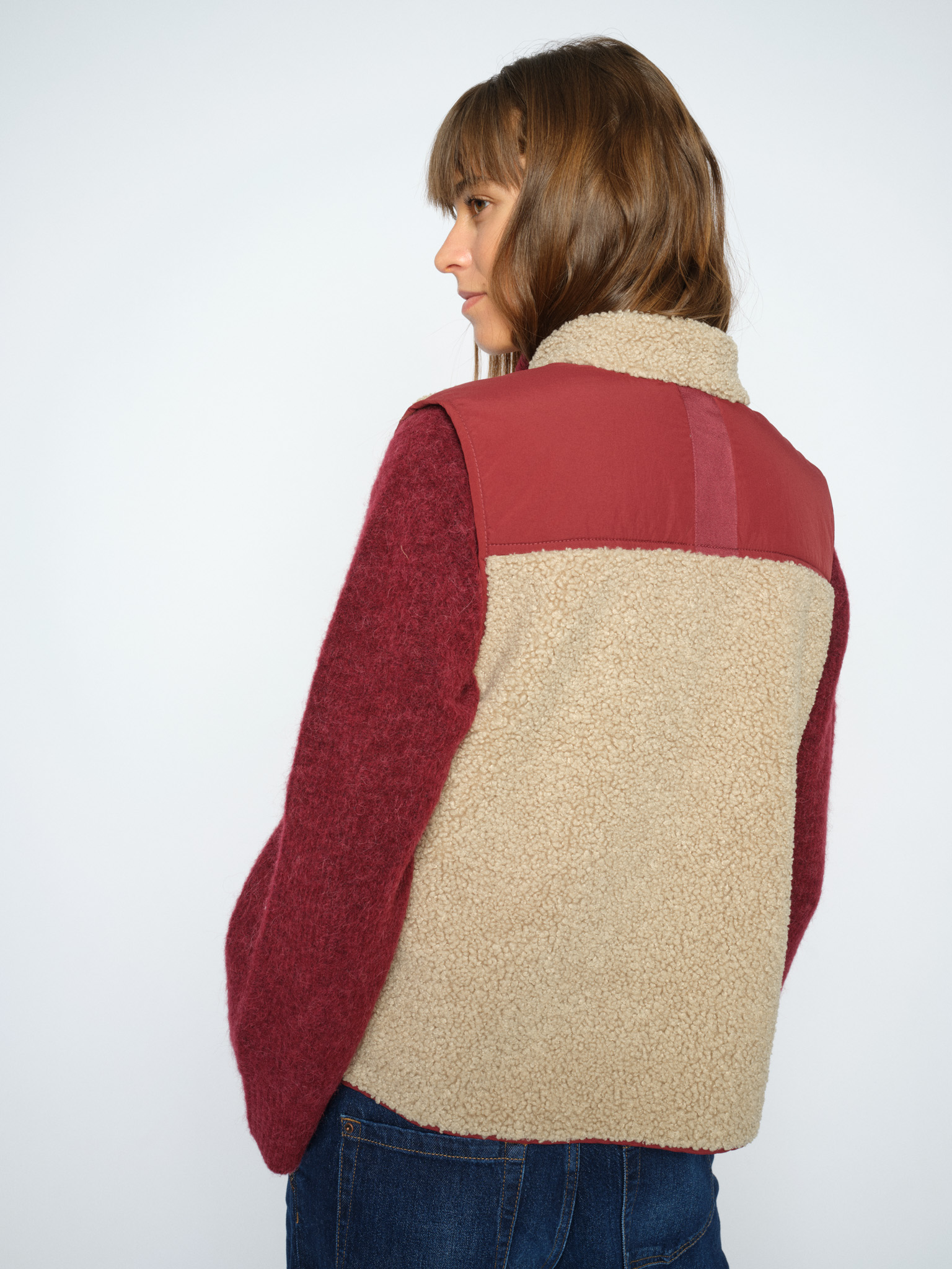 model rear shot of wearing vest
