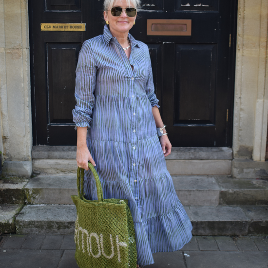 blue dress with green stripe detail 