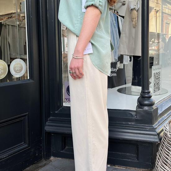 Cream straight leg trousers