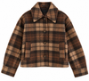 A cropped plaid jacket in brown, beige, and black, featuring a pointed collar, three-quarter button closure, and two front flap pockets.