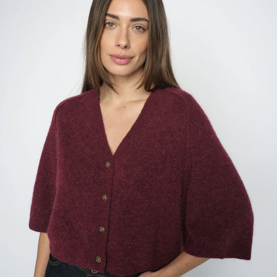 burgundy mos mosh cardigan on a model