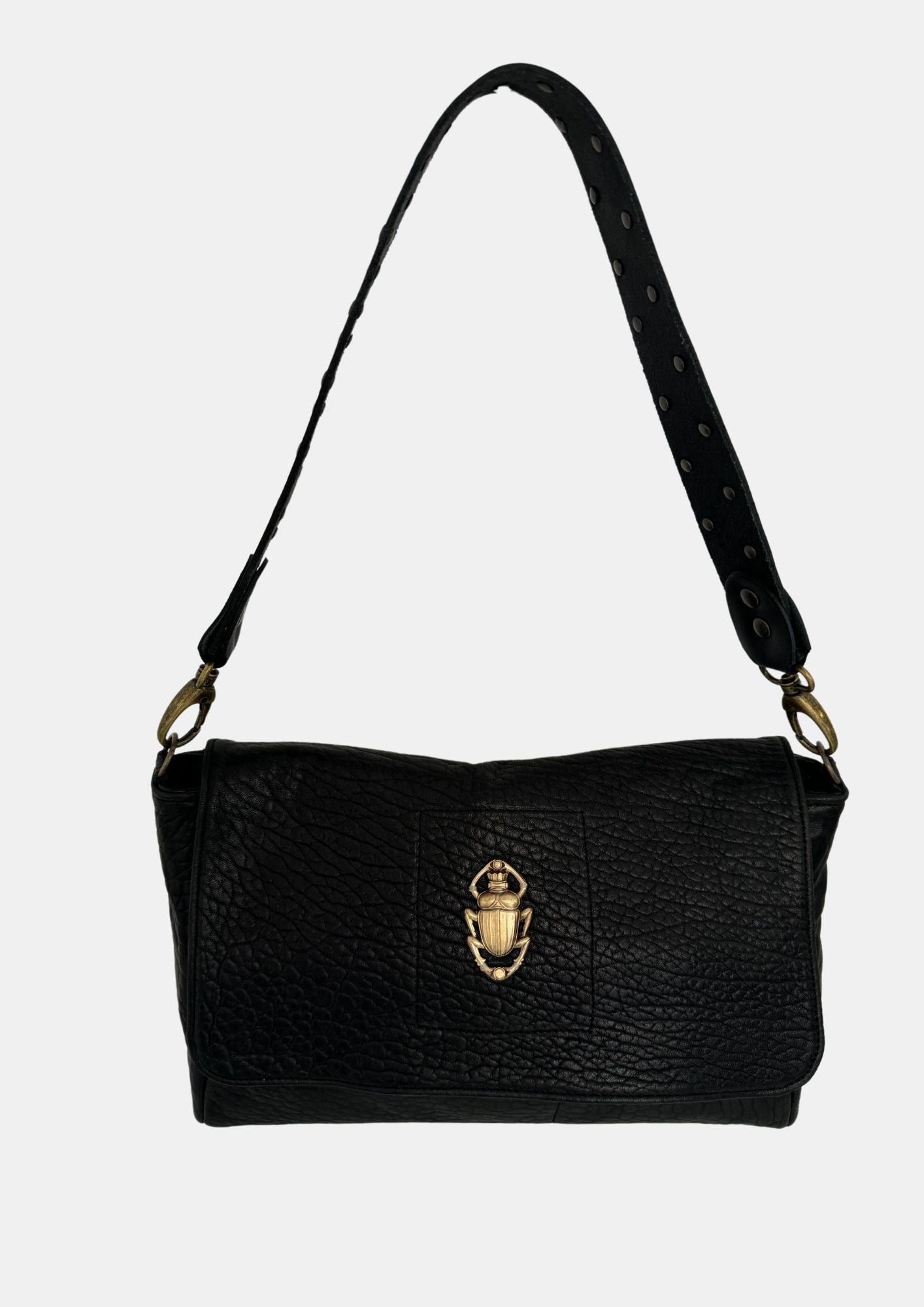 black lamb leather fold over bag with rivet strap and gold scarab emblum