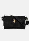 black lamb leather fold over bag with rivet strap and gold scarab emblum