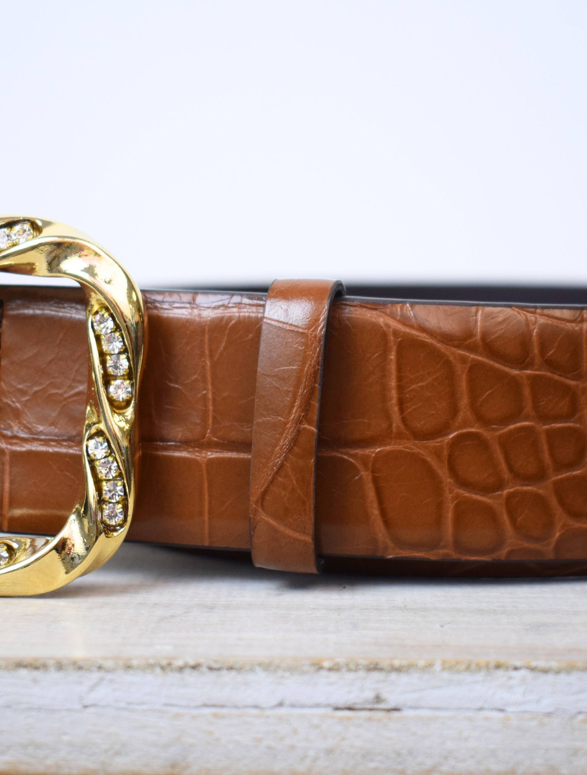 Wide mock croc tan leather belt with large gold metallic and bejewelled oblong buckle