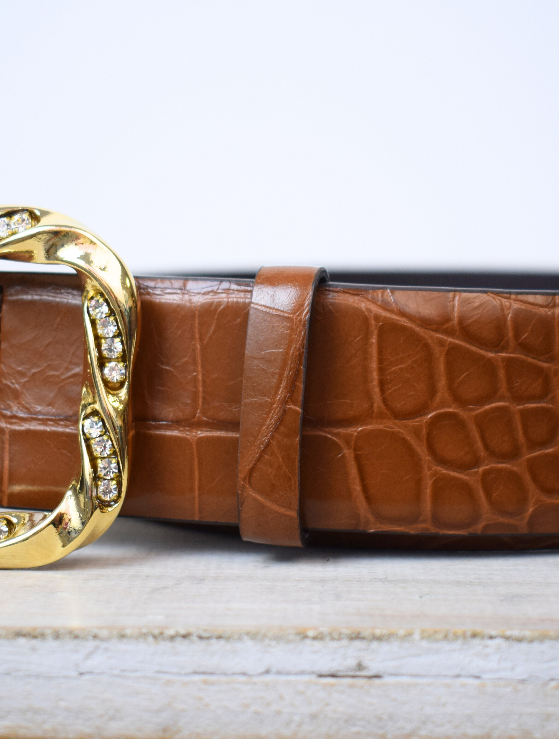 Wide mock croc tan leather belt with large gold metallic and bejewelled oblong buckle