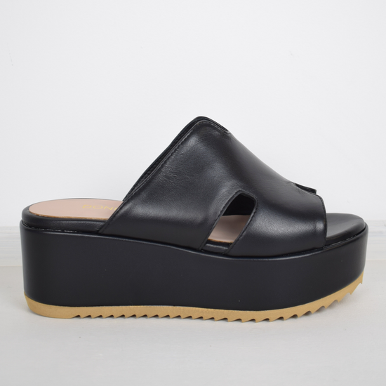 Black sandals with a large platform 