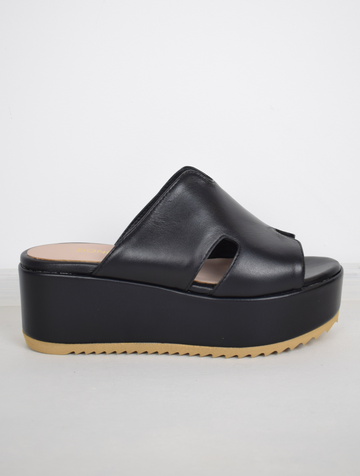 Black sandals with a large platform 