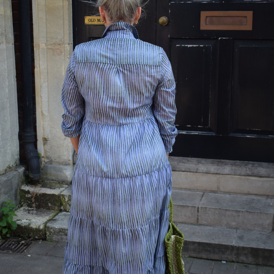 blue dress with green stripe detail 