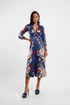 v neck mid length silk button down dress with tie front and eagle inspired print model shot