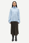 turtleneck heavy knit jumper with ribbed edging and a light blue hue from samsoe samsoe model shot
