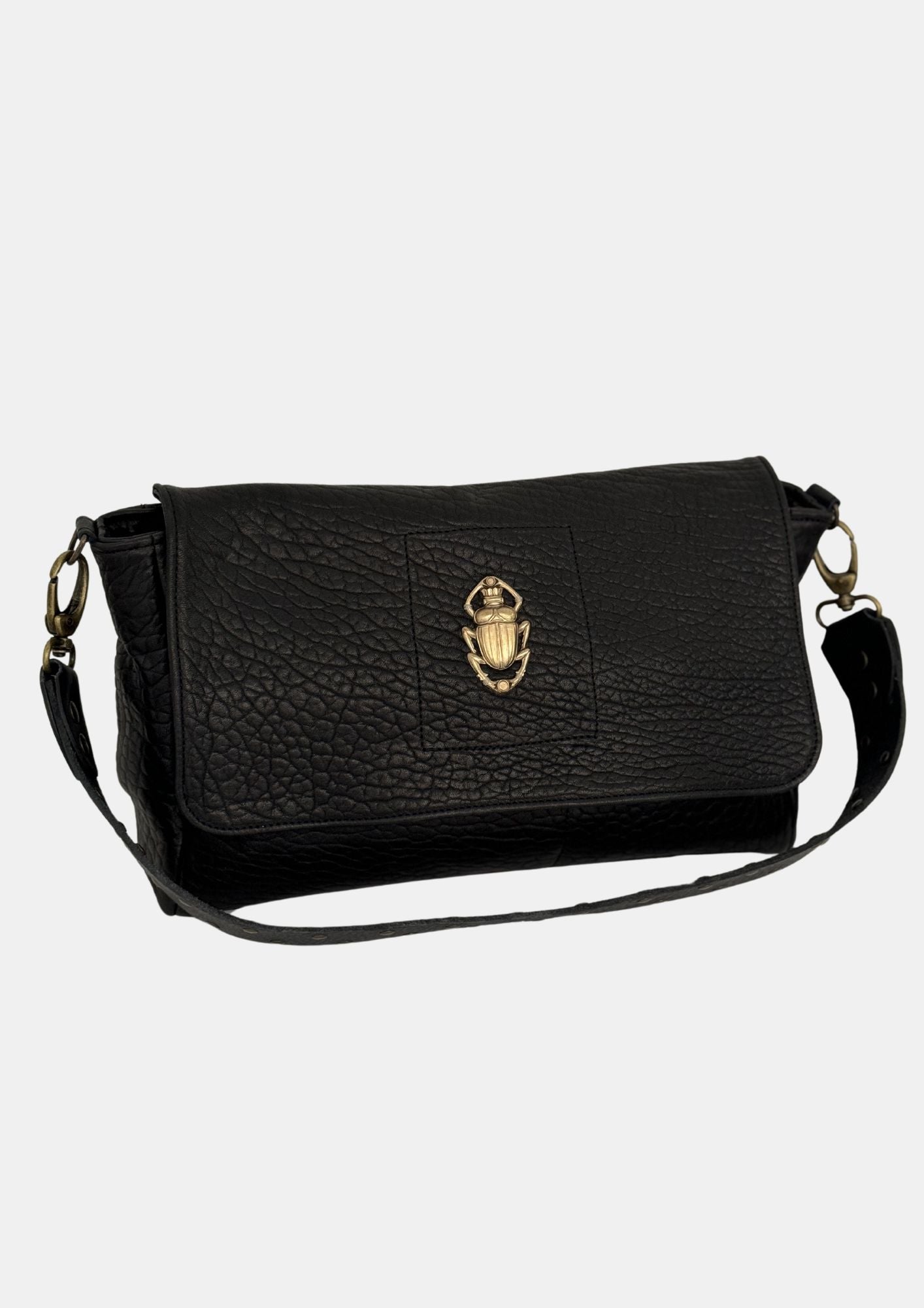 black lamb leather fold over bag with rivet strap and gold scarab emblum