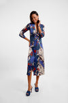 v neck mid length silk button down dress with tie front and eagle inspired print moel shot
