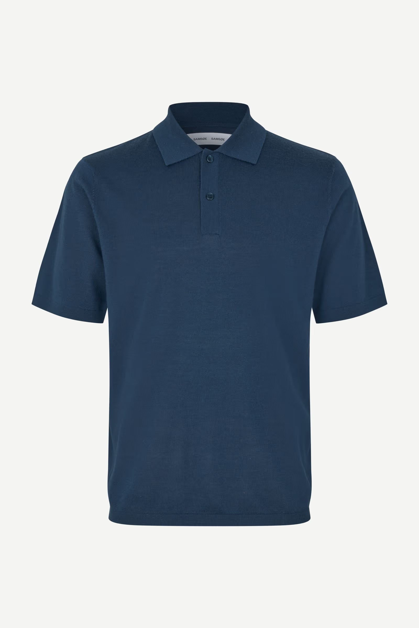 Blue polo shirt on a white background