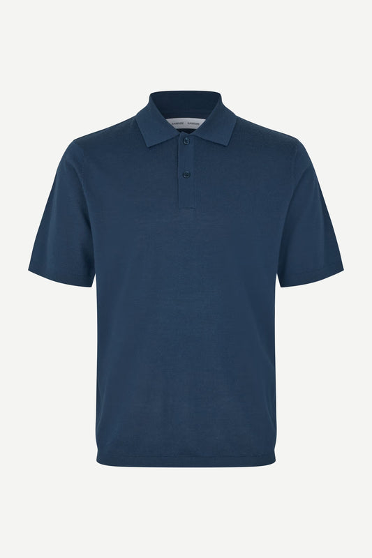 Blue polo shirt on a white background