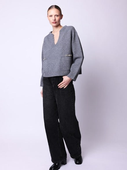 Grey v-neck jumper with 2 front pockets pockets and gold buckle detailing