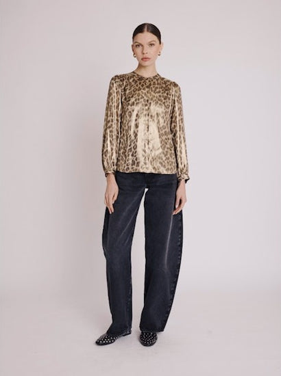 Front view of long sleeved leopard print shirt with round neckline