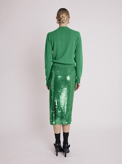 Mid length green sequin skirt detailing rear split