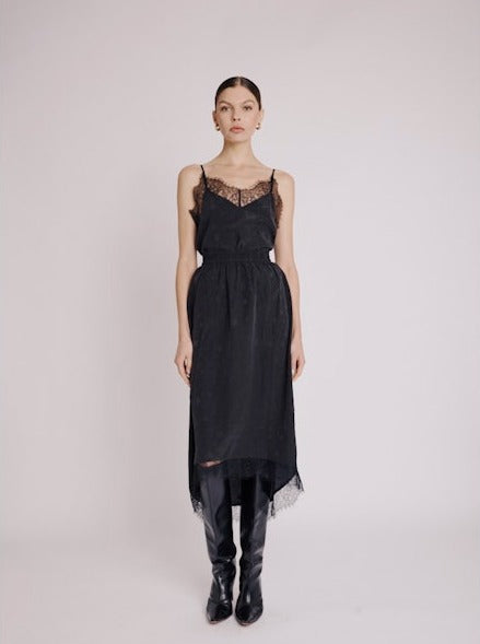 Black mid-length skirt with delicate lace trim and tone on tone star design