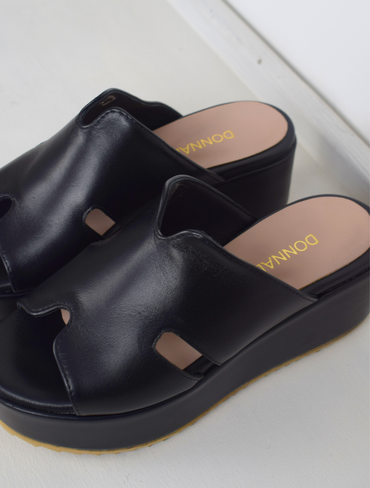 Black sandals with a large platform 