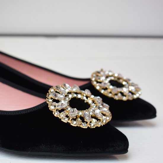 Black velvet pointed toe ballet pumps with gold and diamante brooch on toe