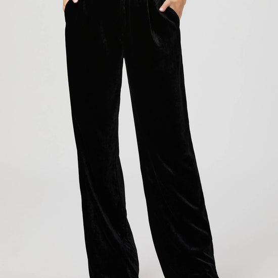 wide leg black velvet trousers close up