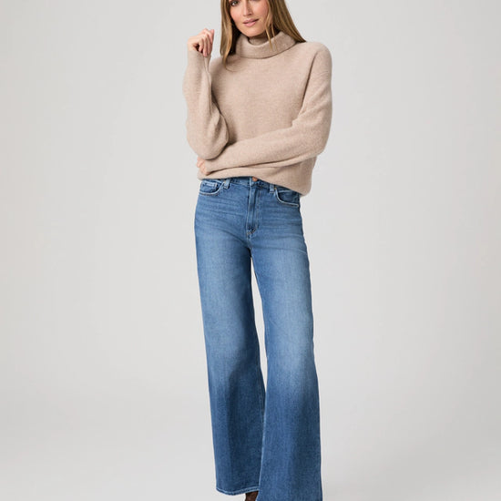 mid blue wide leg jeans from paige model shot