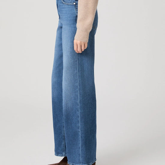 mid blue wide leg jeans from paige side view