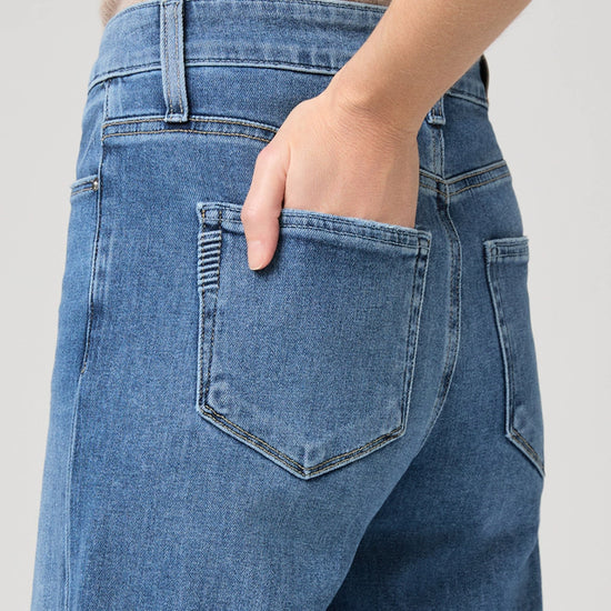 mid blue wide leg jeans from paige close up of rear