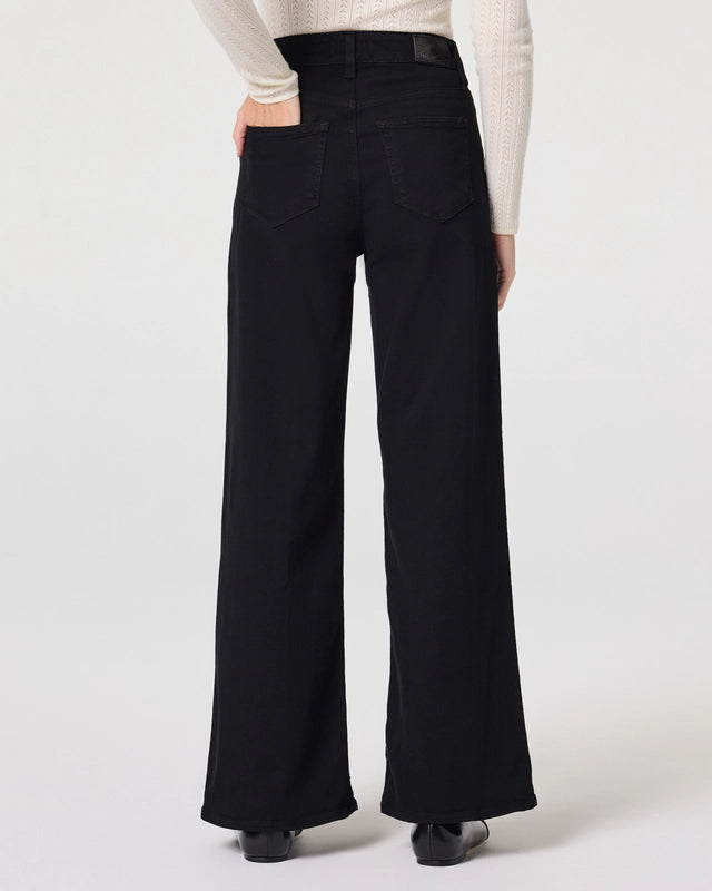 Rear view of black wide leg jeans from Paige