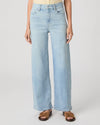 Light blue jeans worn by a person on a white background