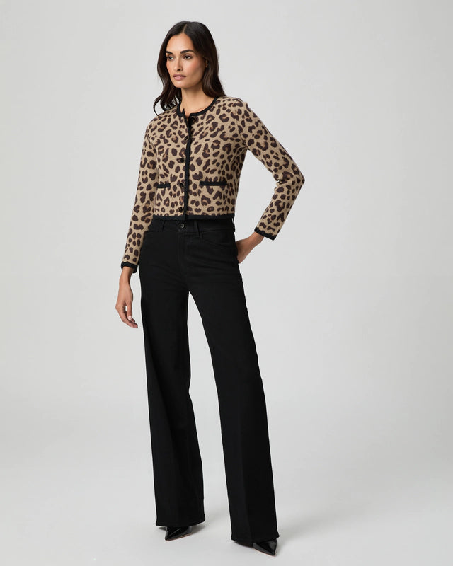 Woman wearing a leopard print cardigan and black jeans from paige