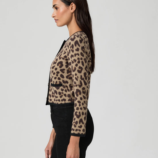 Woman wearing a leopard print cardigan from Paige