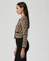 Woman wearing a leopard print cardigan from Paige