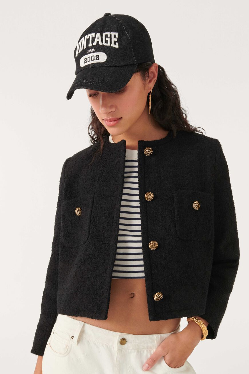 Cropped woven black jacket with two front chest patch pockets and gold buttons