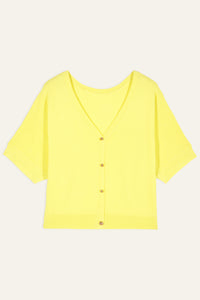 Bright yellow cropped cardigan with deep V neckline and small twist gold metallic buttons