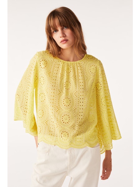 Yellow crew neck top with semi sheer fabric and broderie anglais throughout