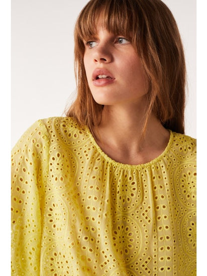 Yellow crew neck top with semi sheer fabric and broderie anglais throughout