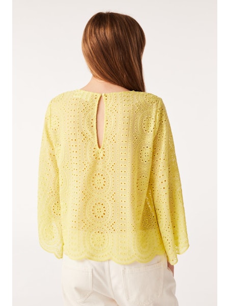 Yellow crew neck top with semi sheer fabric and broderie anglais throughout